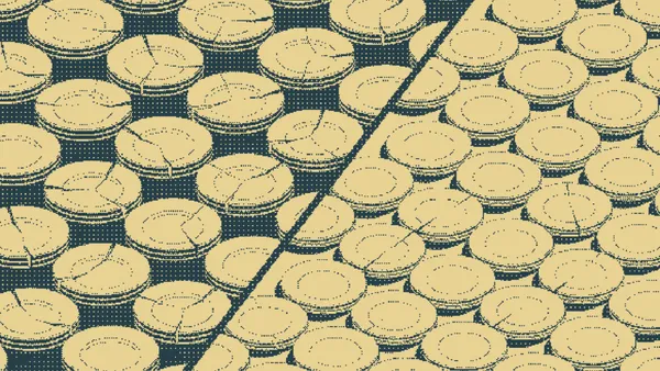 Cracked coins stacked haphazardly beside neat columns of unblemished coins